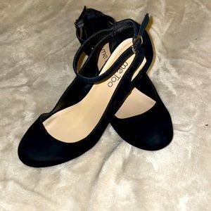 Black heeled flats